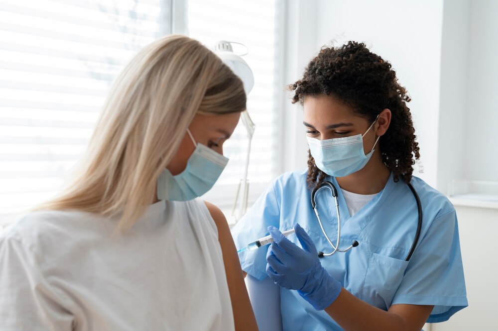 Female nurse at the clinic practicing medicine
